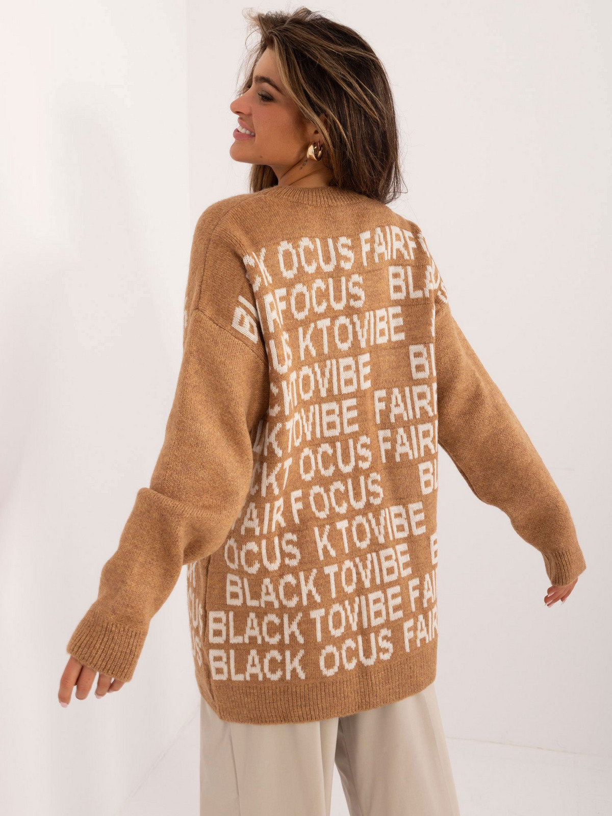 Brown long sweater with inscriptions