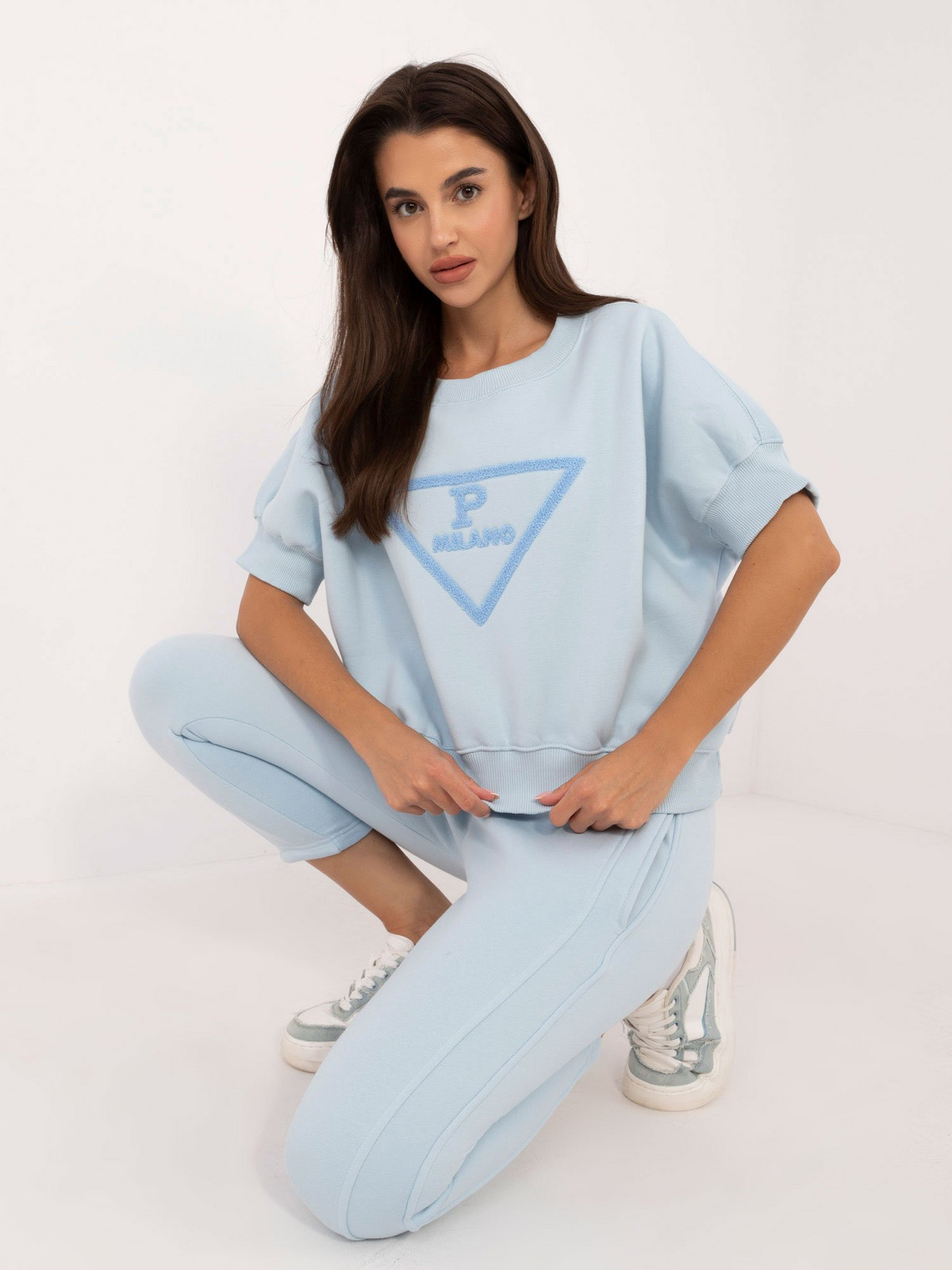 Light blue tracksuit with patch