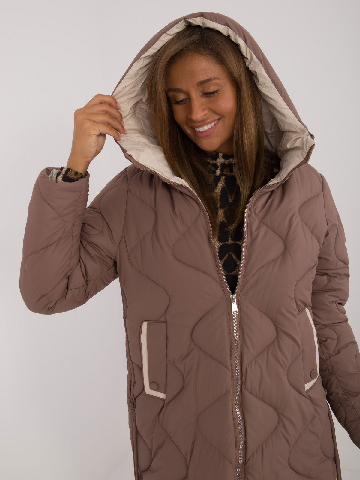Brown quilted poloseason jacket with hood