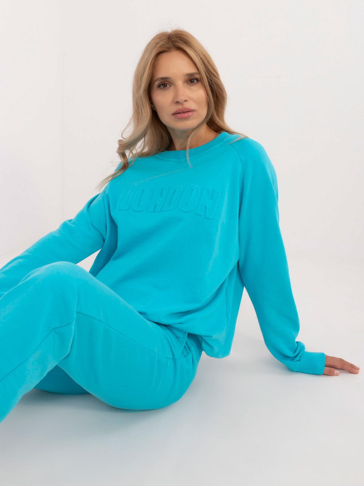 Turquoise tracksuit with straight trousers