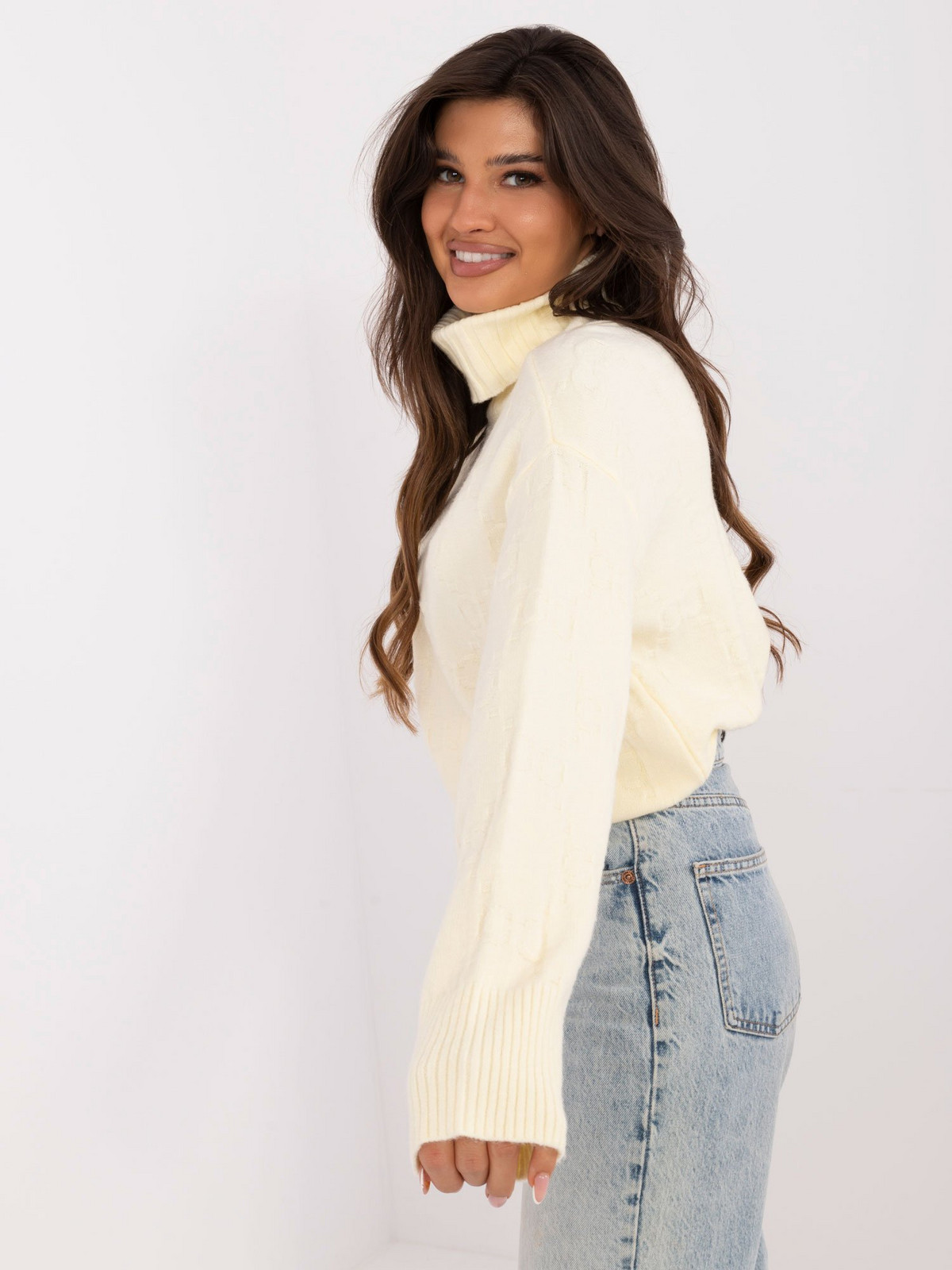 Light yellow women's turtleneck with patterns
