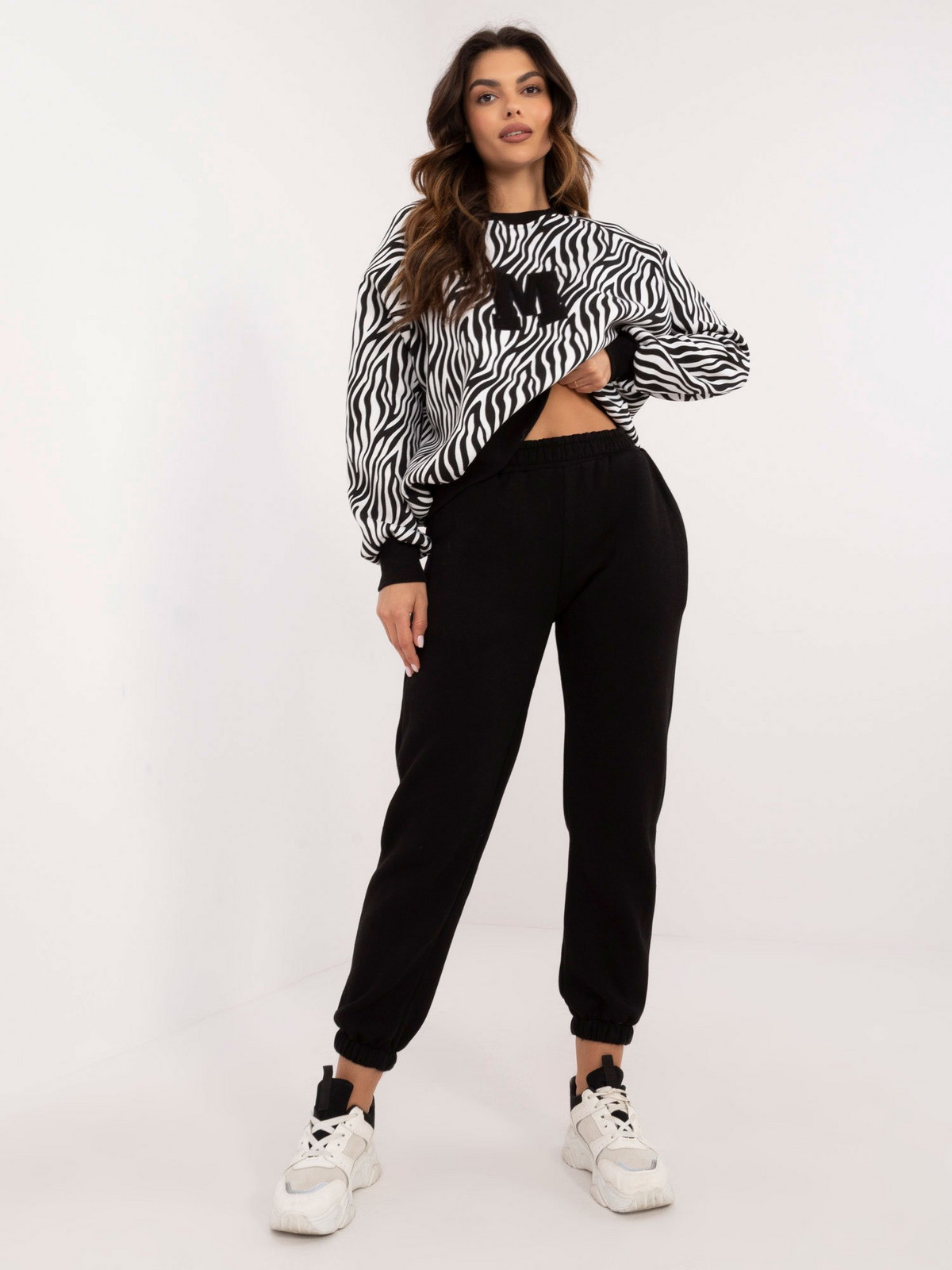 White and black women's tracksuit
