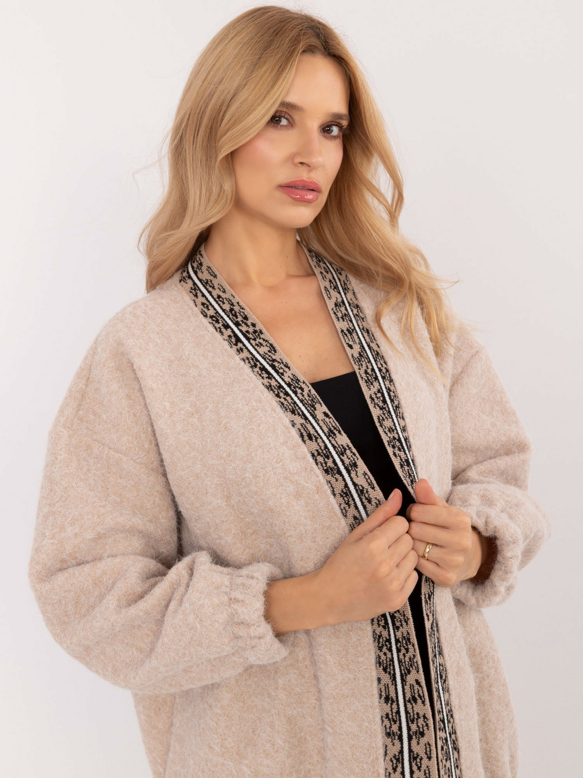 Beige women's cardigan with decorative trim