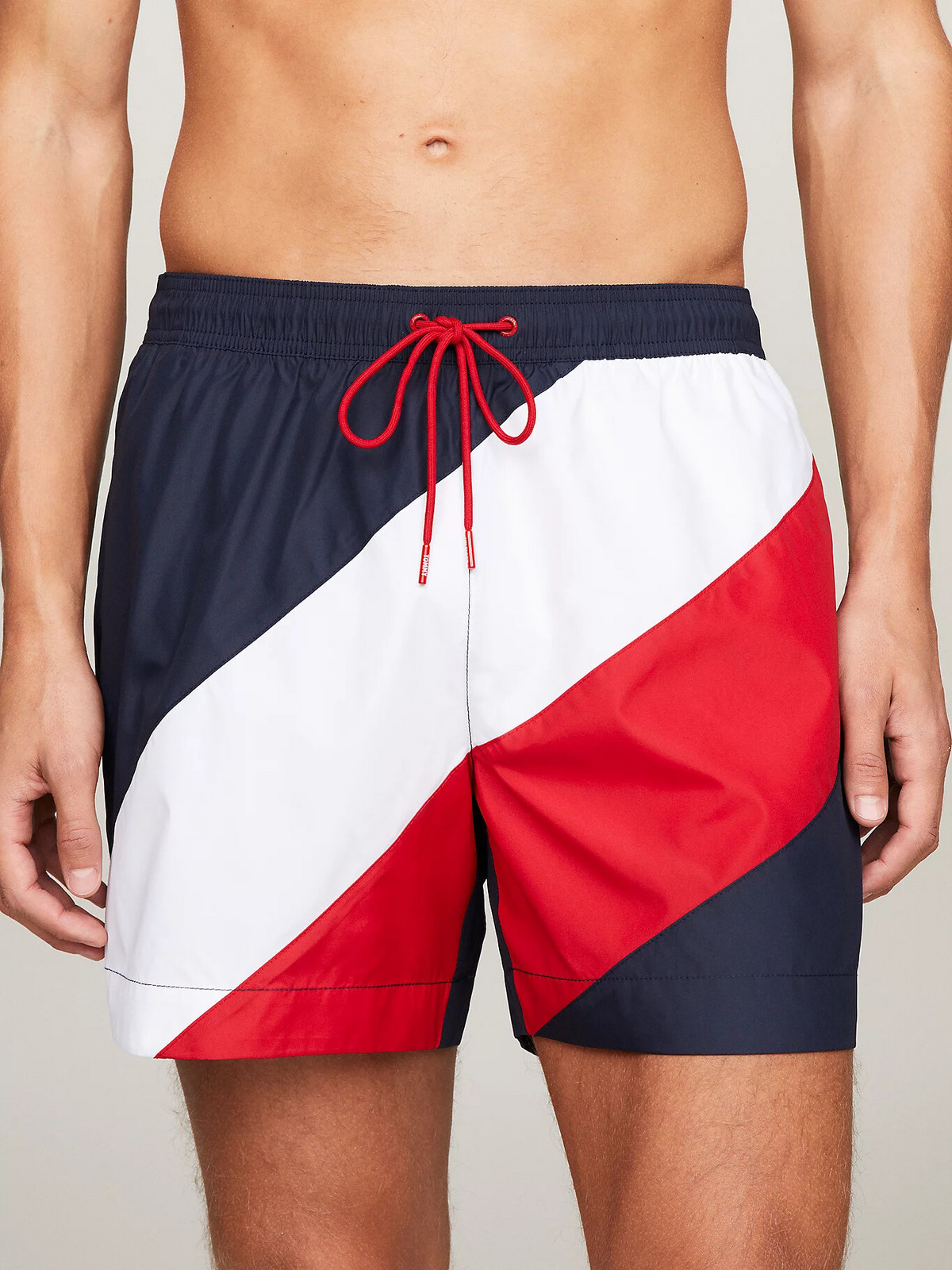 Pánske plavky UM0UM03261 DW5 tm. modrá s prúžkami - Tommy Hilfiger M