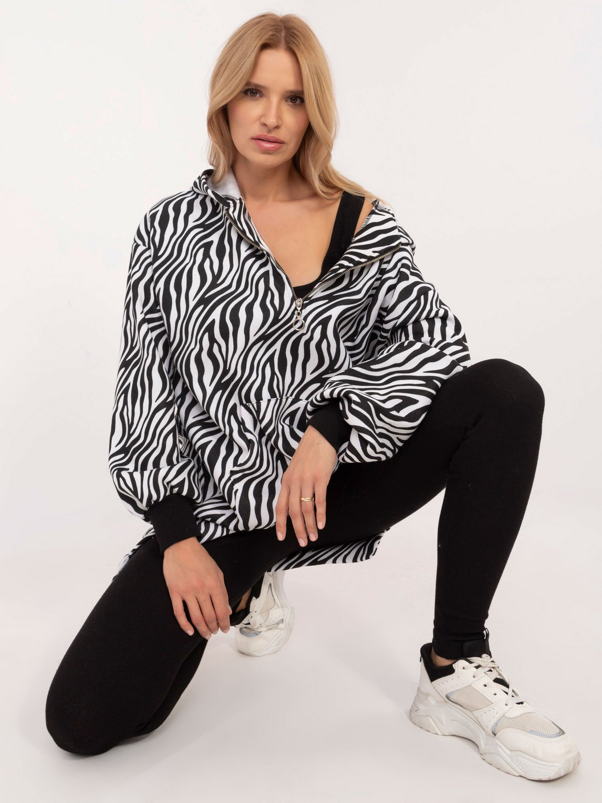 Black and white three-piece set with a printed sweatshirt