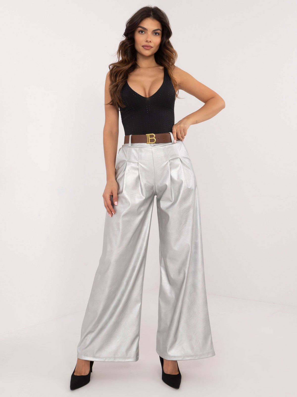 Silver women's trousers made of eco-leather with pockets