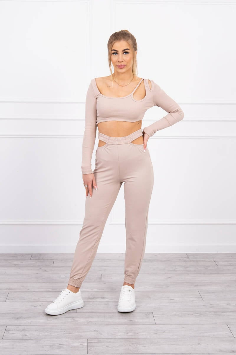 Complete with a beige blouse top