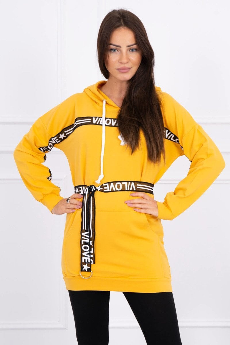 Dress decorated with a mustard inscription tape
