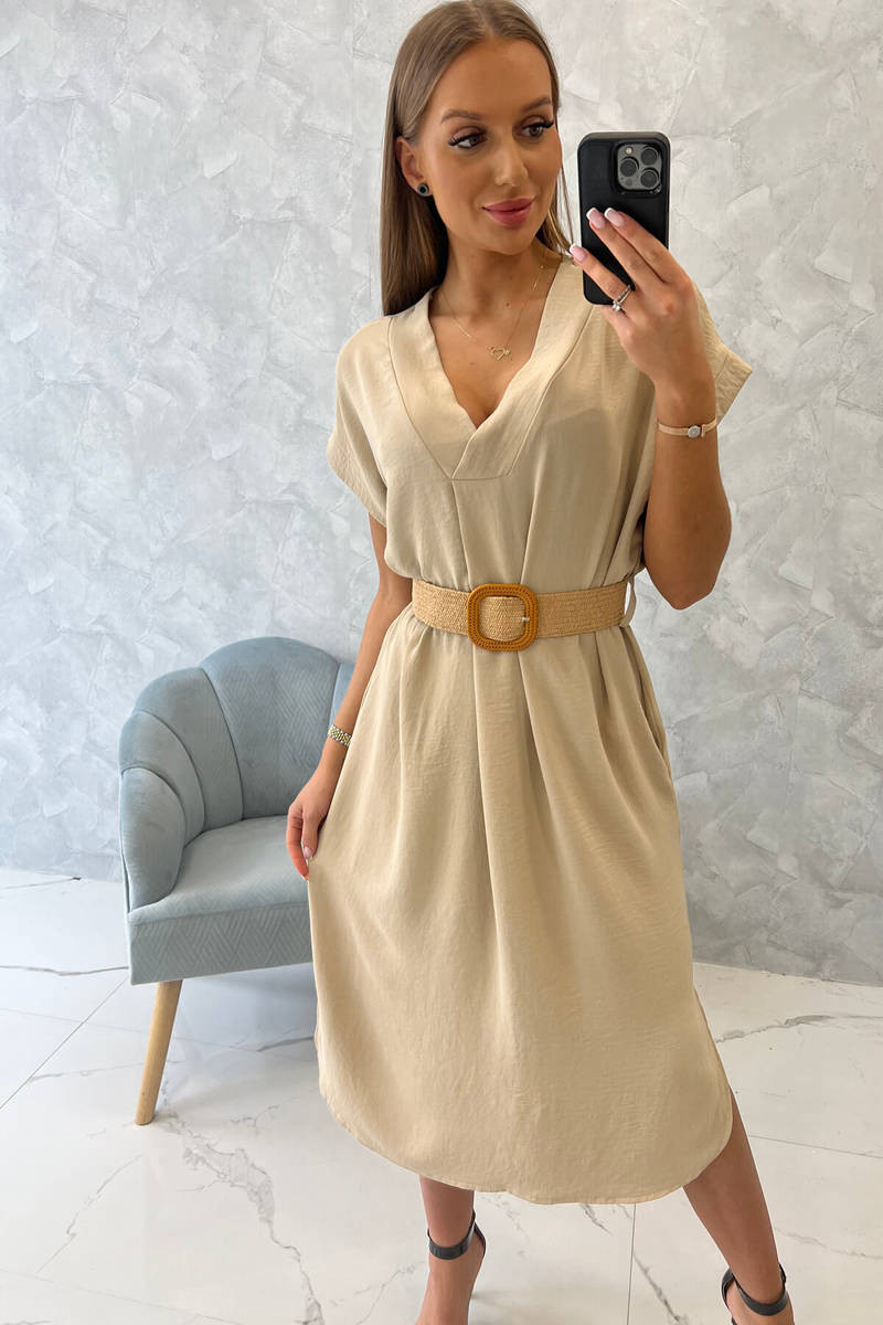 Dress with decorative belt in beige color