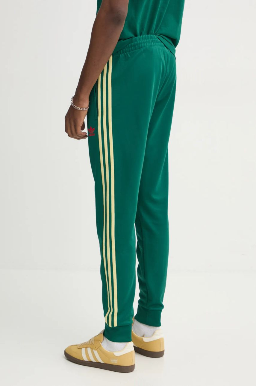 Tepláky adidas Originals SST TP zelená farba, s nášivkou, JP1224