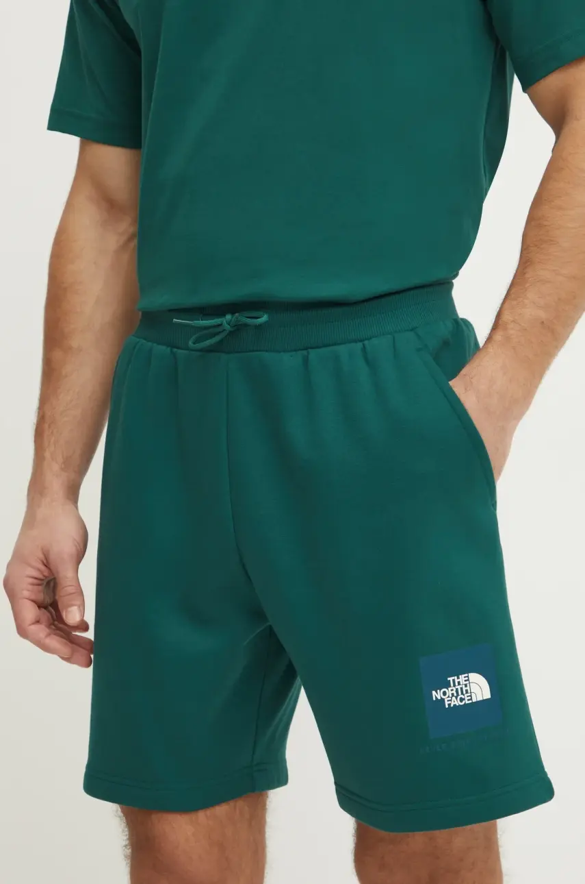 Šortky The North Face Nuptse Regular pánske, zelená farba, NF0A8C1JA1B1