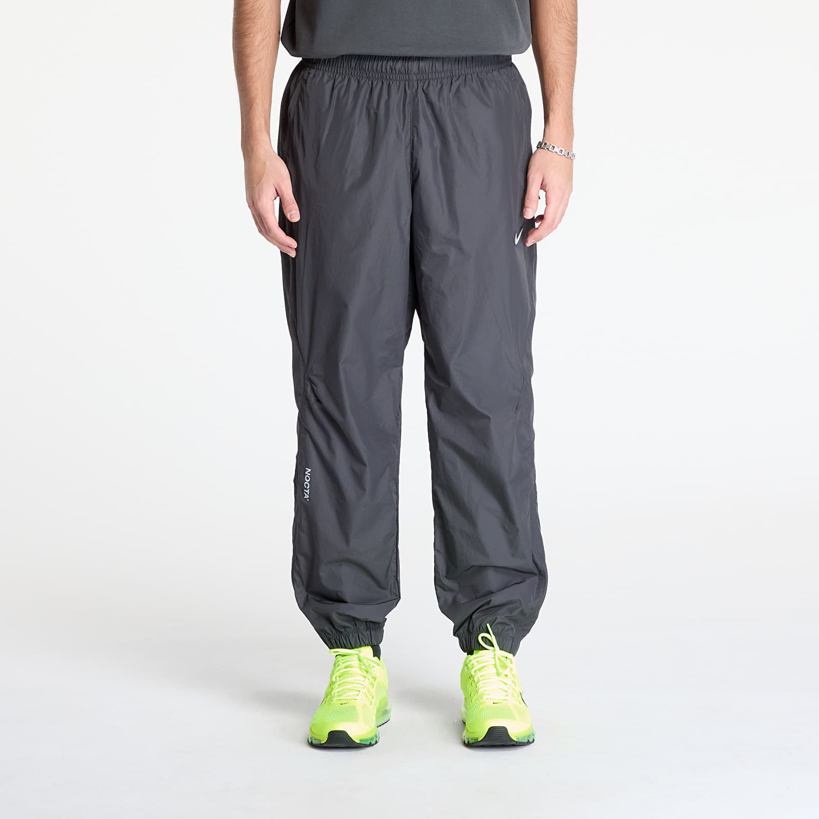 Kalhoty Nike x NOCTA Northstar Nylon Track Pants Anthracite/ Iron Grey/ Wolf Grey/ Wolf Grey XS