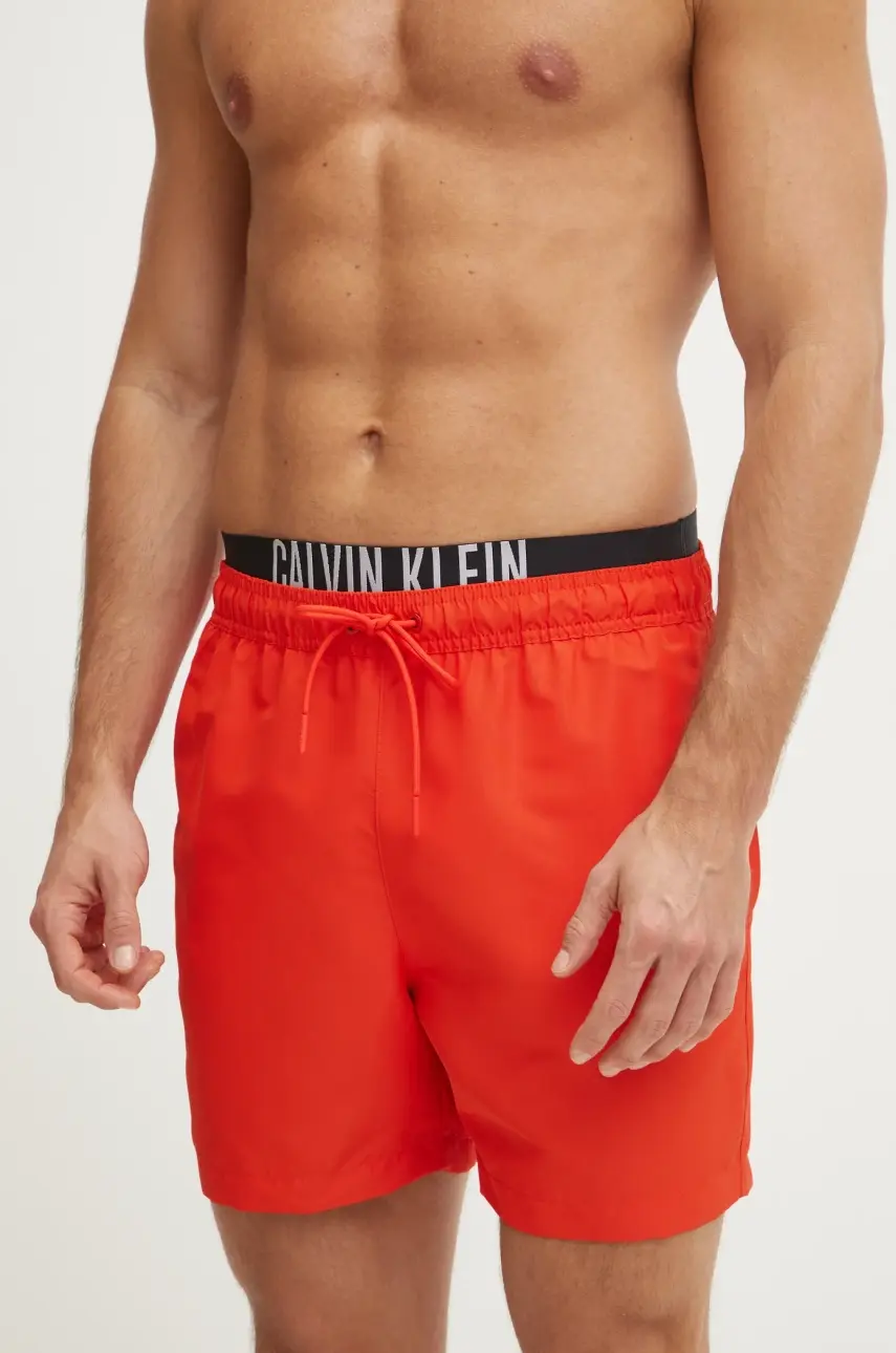 Plavkové šortky Calvin Klein červená farba, KM0KM01093