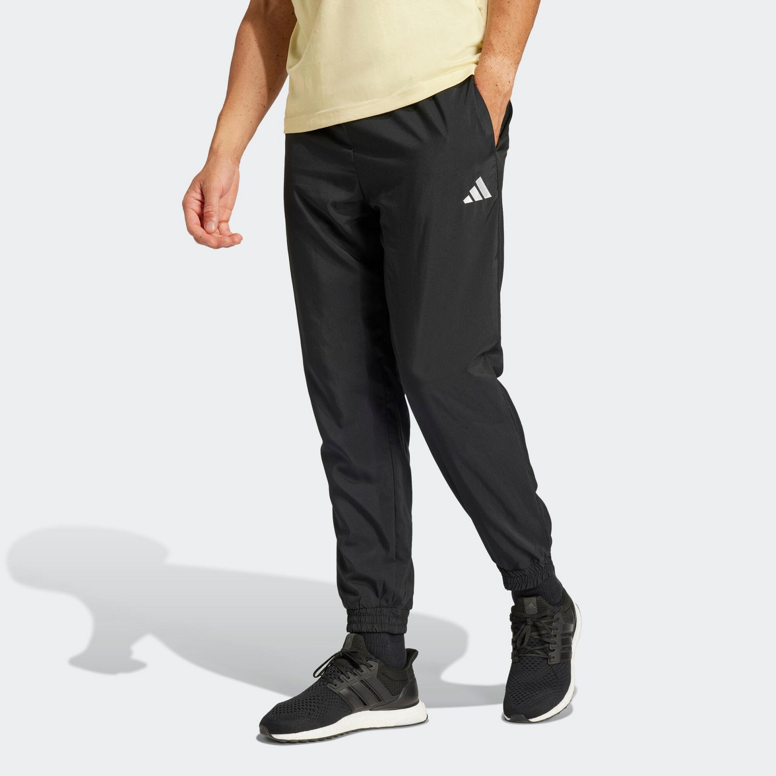 ADIDAS pánske bežecké nohavice čierne