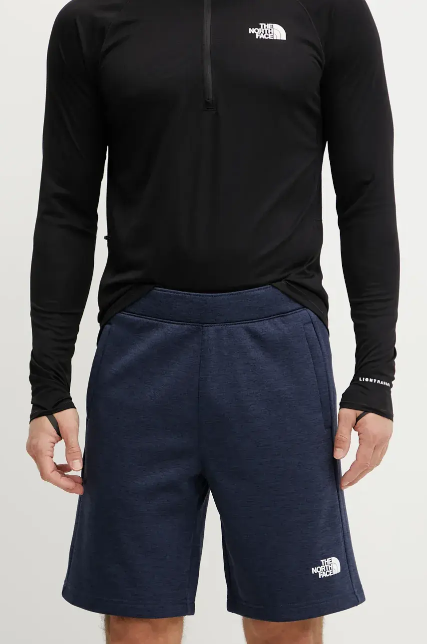 Šortky The North Face Reaxion pánske, tmavomodrá farba, melanžové, NF0A8BET8Q01