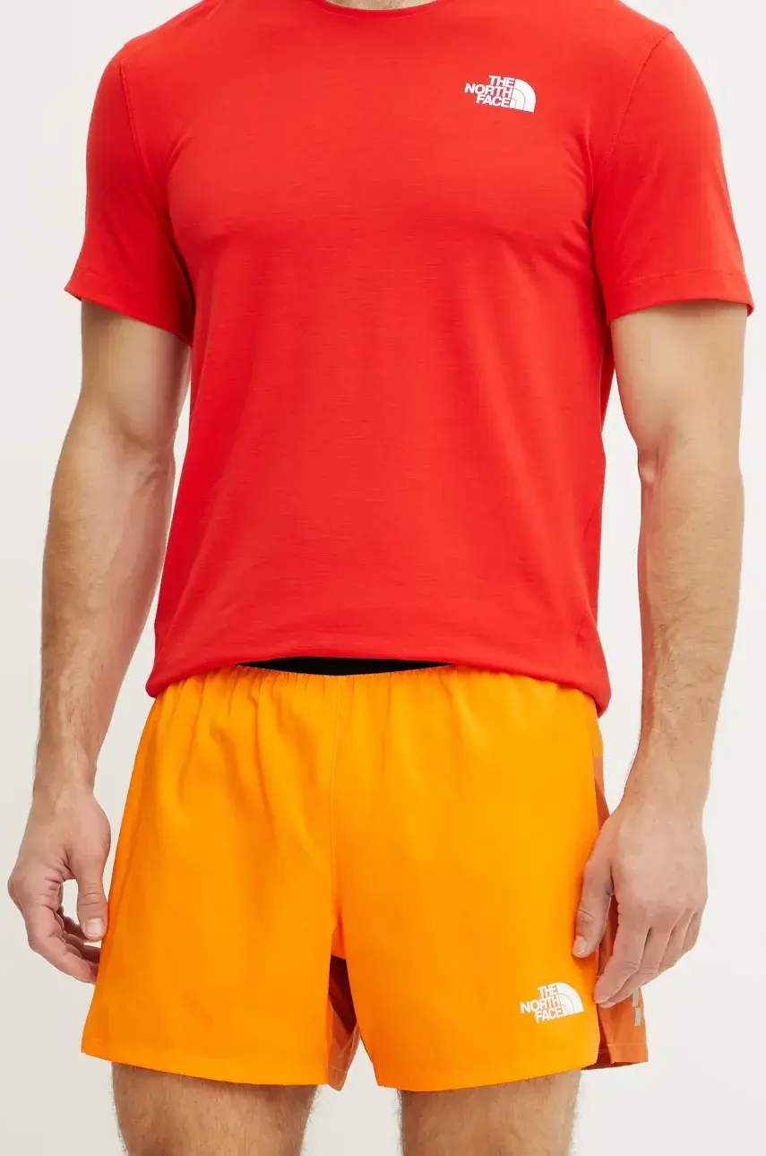 Športové krátke nohavice The North Face Breeze pánske, oranžová farba, NF0A892N58B1