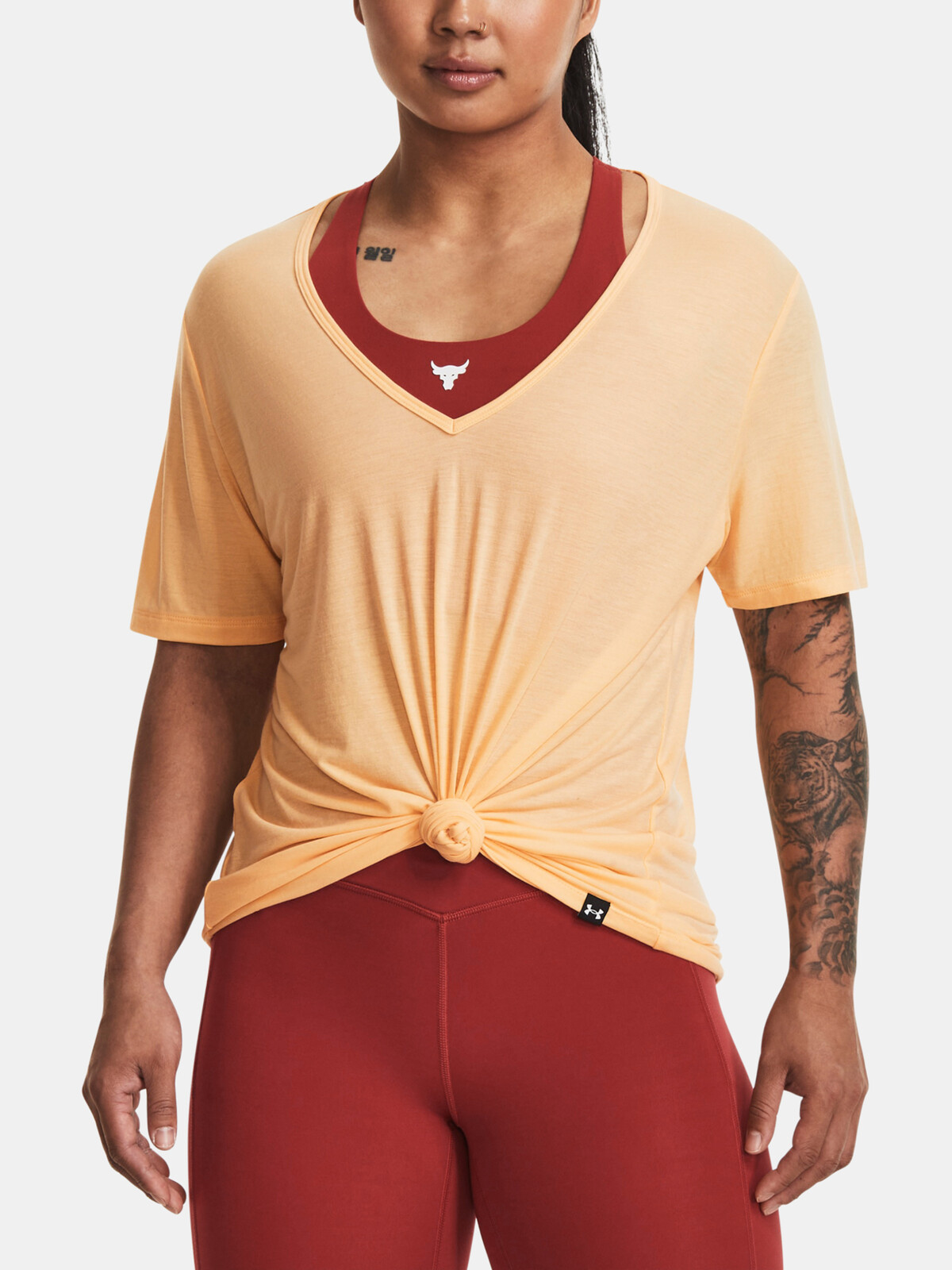 Marhuľové dámske športové tričko Under Armour Rock Completer
