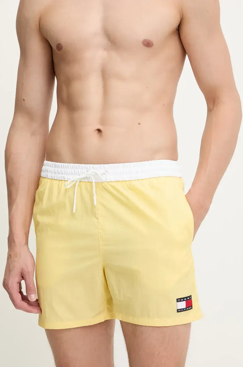 Plavkové šortky Tommy Hilfiger žltá farba, UM0UM03455