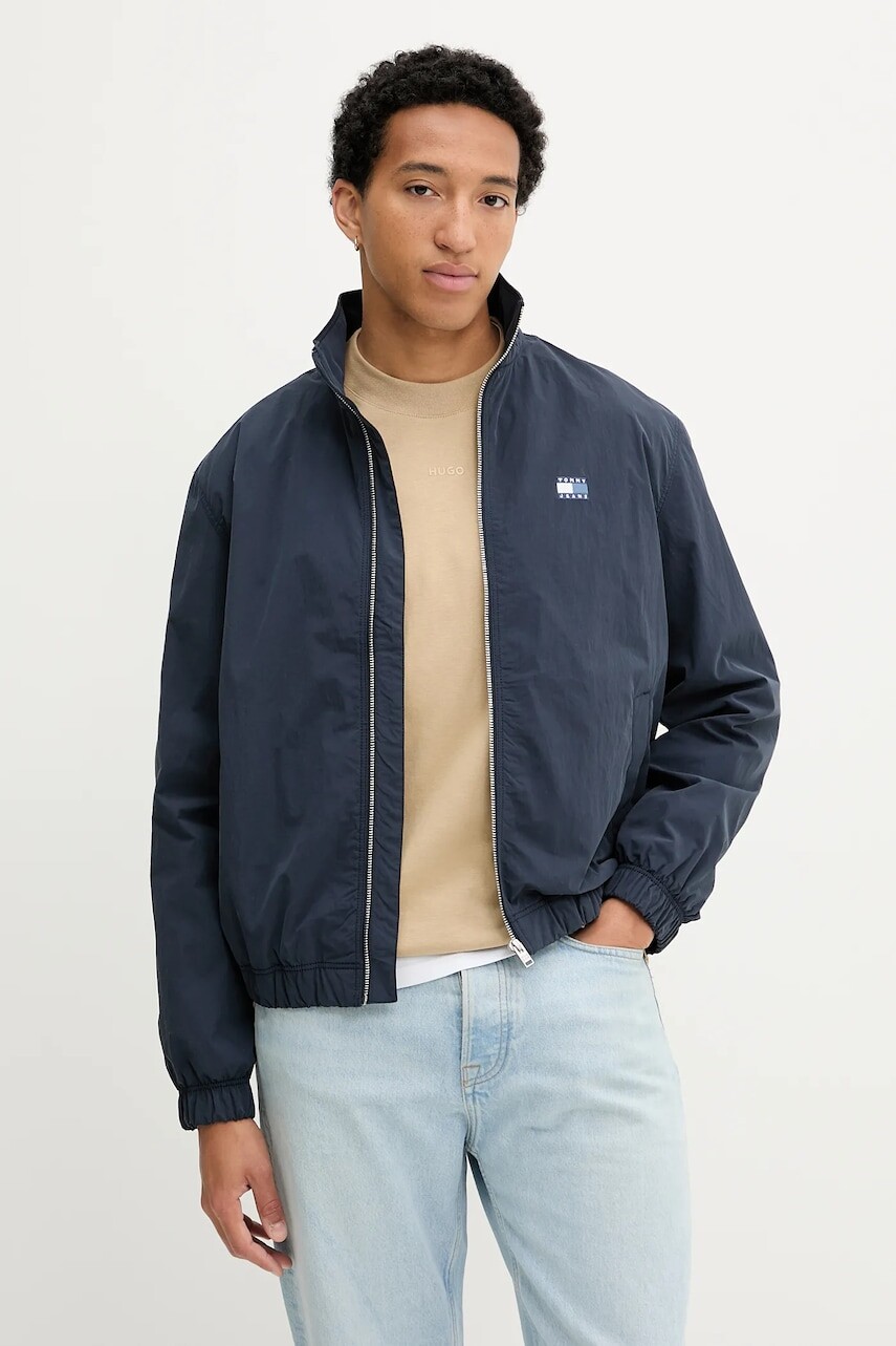 Bunda Tommy Jeans tmavomodrá farba, prechodná, DM0DM21929