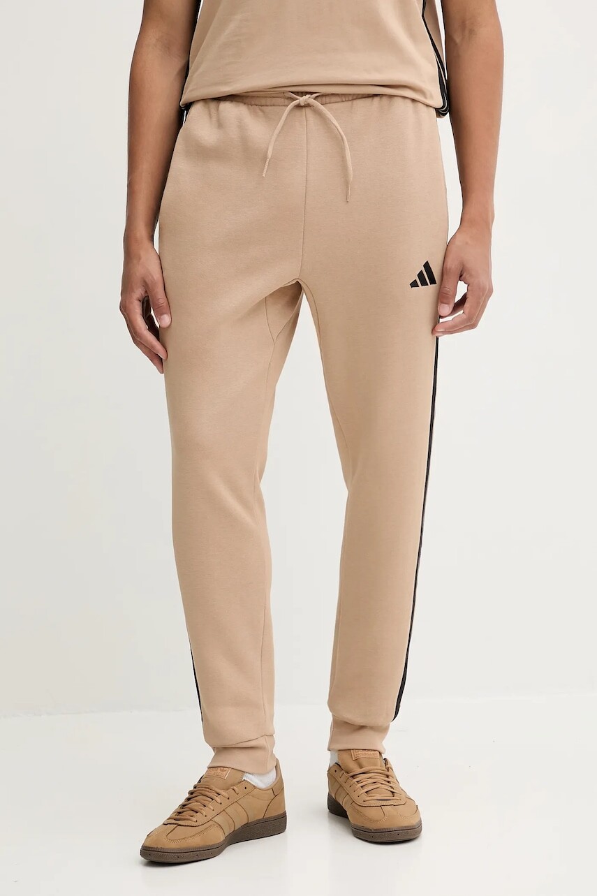 Tepláky adidas Essentials béžová farba, s nášivkou, JX0712