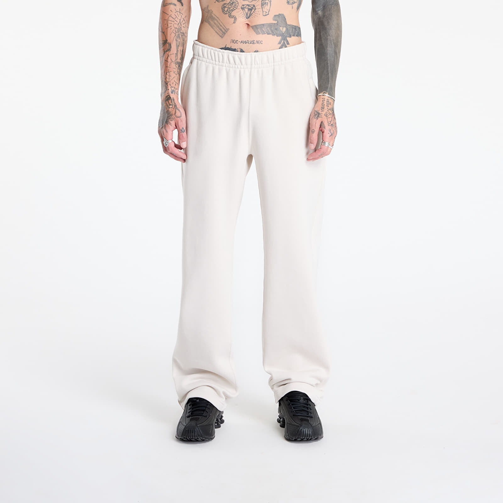 Kalhoty Nike x NOCTA Fleece CS Open-Hem Sweatpants Lt Orewood Brn/ Lt Orewood Brn/ Team Red XS