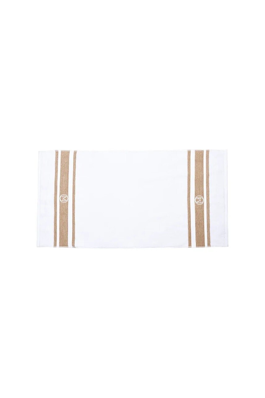 Malý bavlnený uterák Officine Monogram Monogram Linea 50 x 100 cm béžová farba