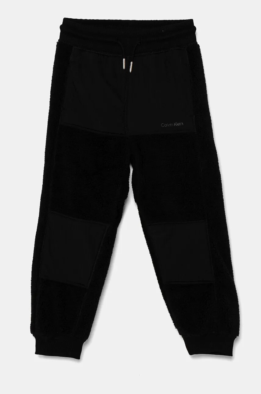 Detské tepláky Calvin Klein Jeans MIX MEDIA TEDD čierna farba, jednofarebné, IB0IB02196