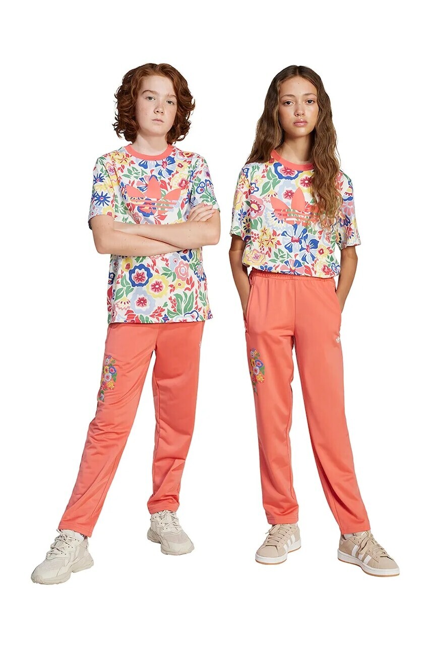 Detské tepláky adidas Originals oranžová farba, s nášivkou, JC6680