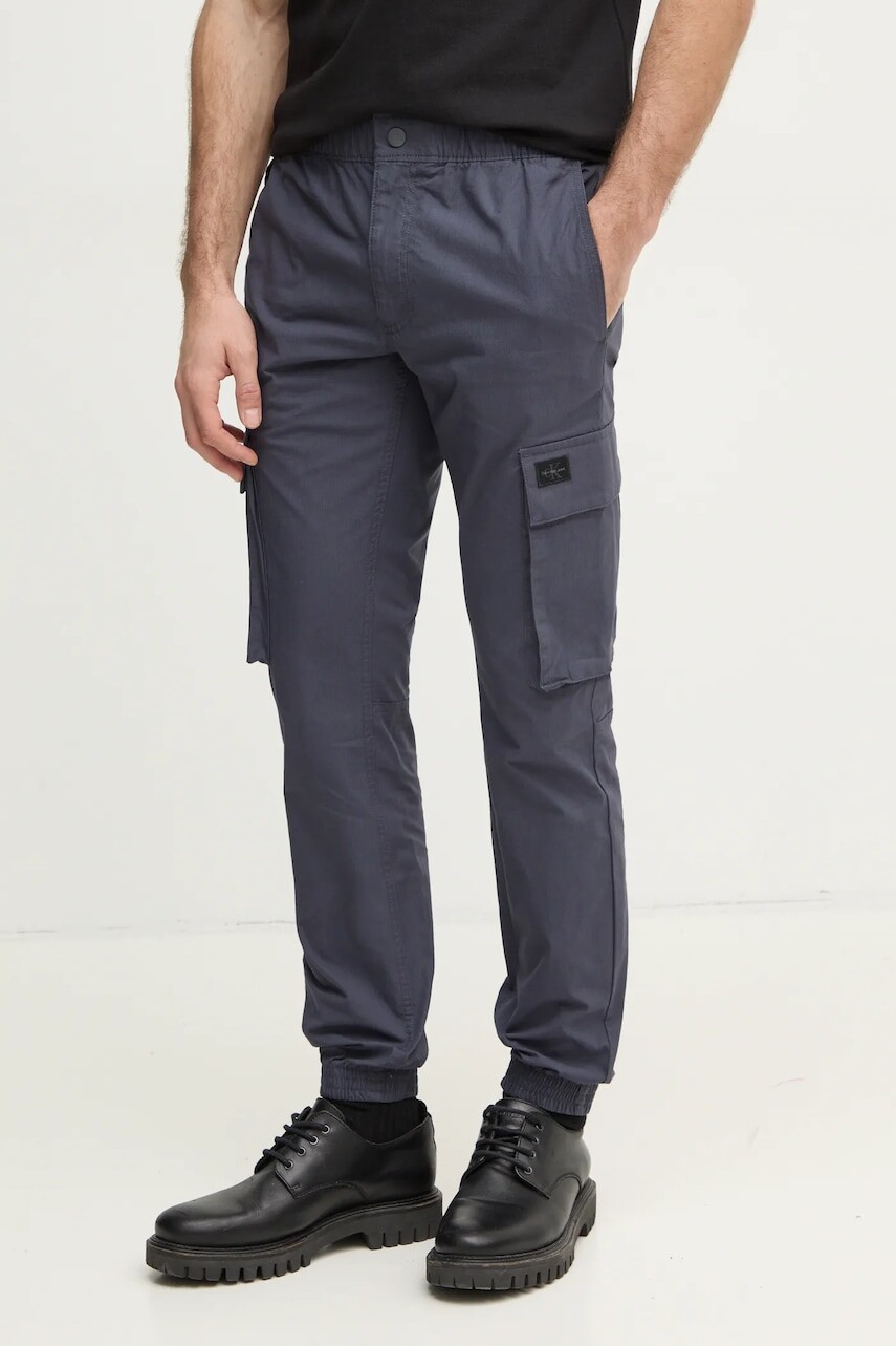 Nohavice Calvin Klein Jeans pánske, tmavomodrá farba, priliehavé, J30J327614