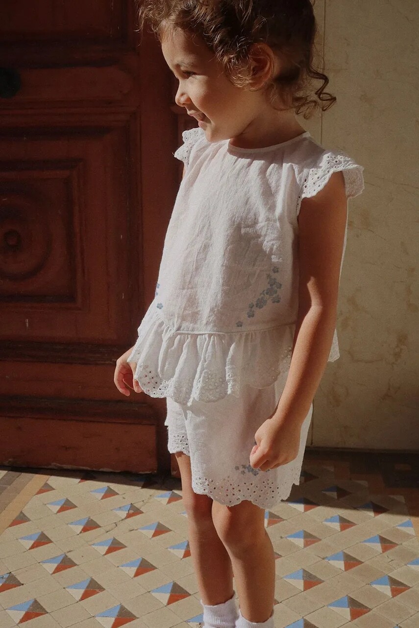 Detské bavlnené šortky Konges Sløjd RHW X KS FIORI SHORTS GOTS biela farba, jednofarebné, Rosie Huntington Whiteley KS103598