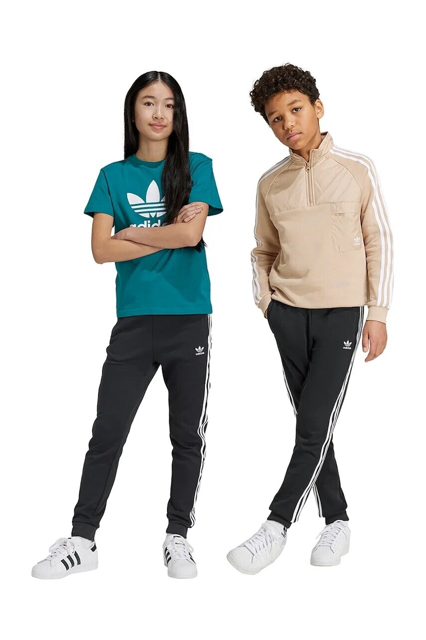 Detské tepláky adidas Originals TREFOIL PANTS čierna farba, s nášivkou, IY7484