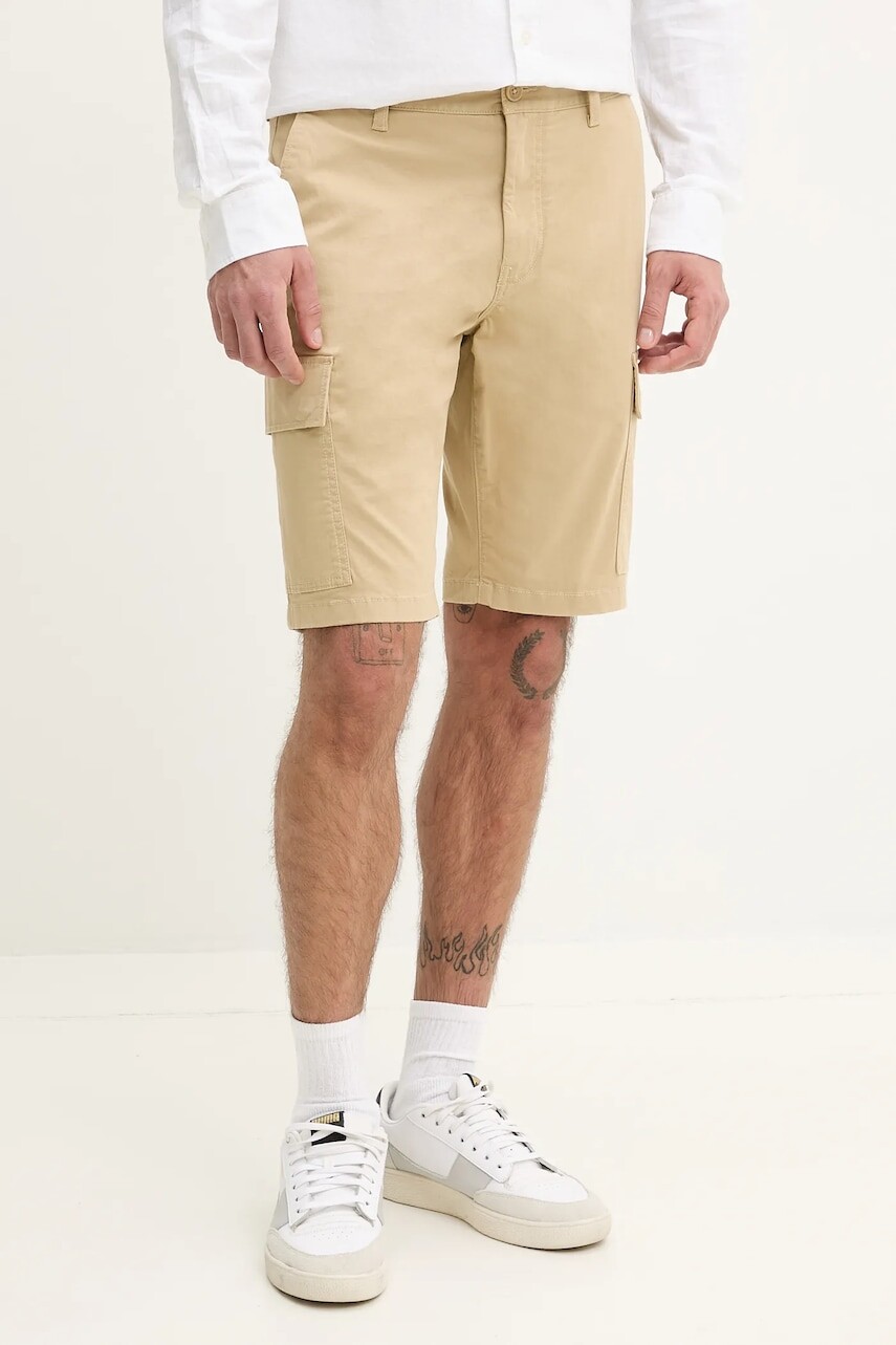 Šortky Tommy Jeans pánske, zelená farba, DM0DM21949