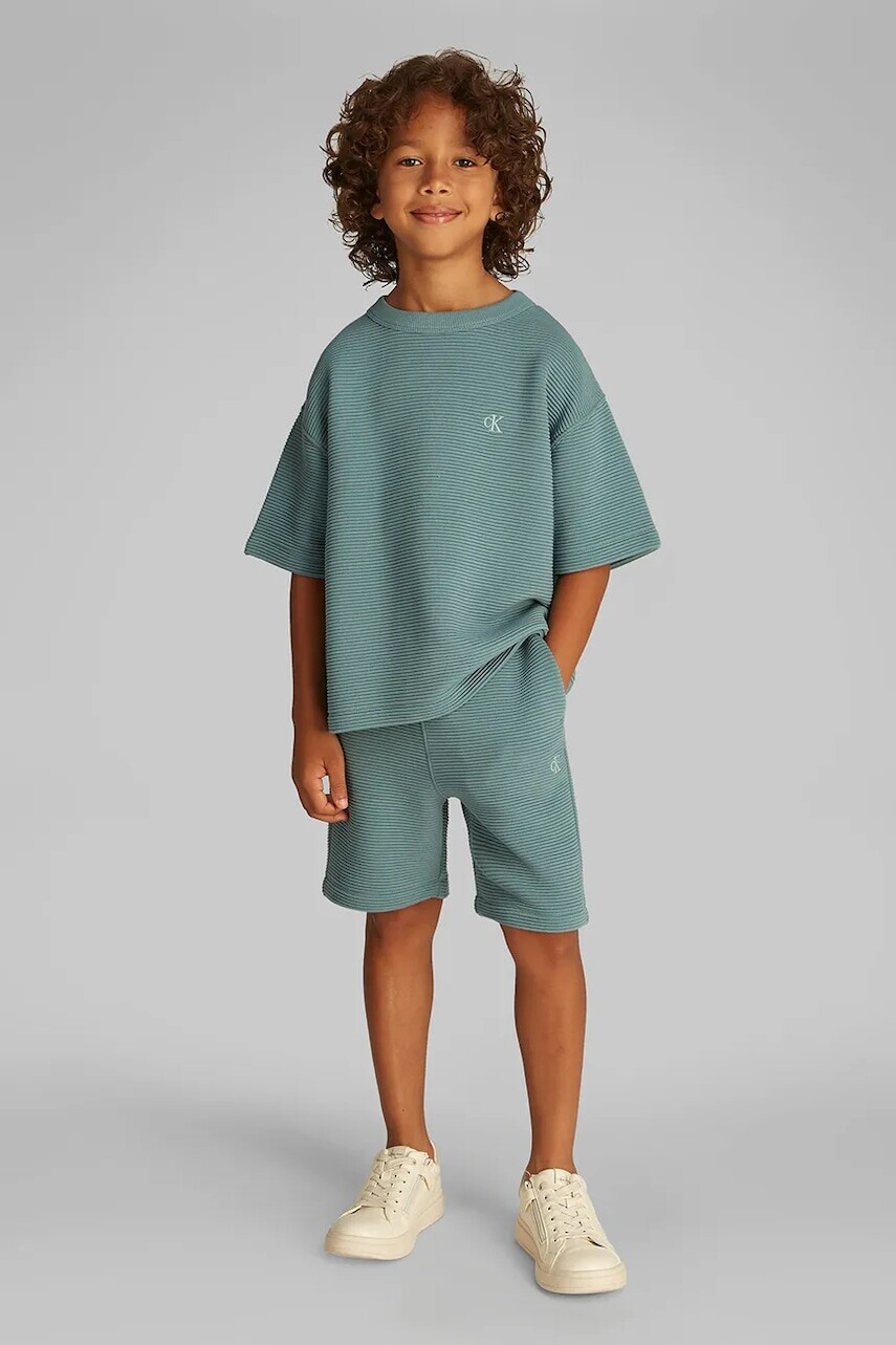 Detská súprava Calvin Klein Jeans zelená farba, IB0IB02503