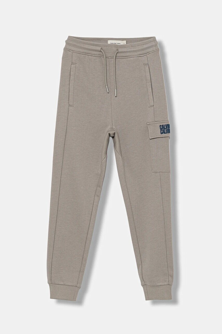 Detské bavlnené tepláky Calvin Klein Jeans TERRY šedá farba, jednofarebné, IB0IB02522