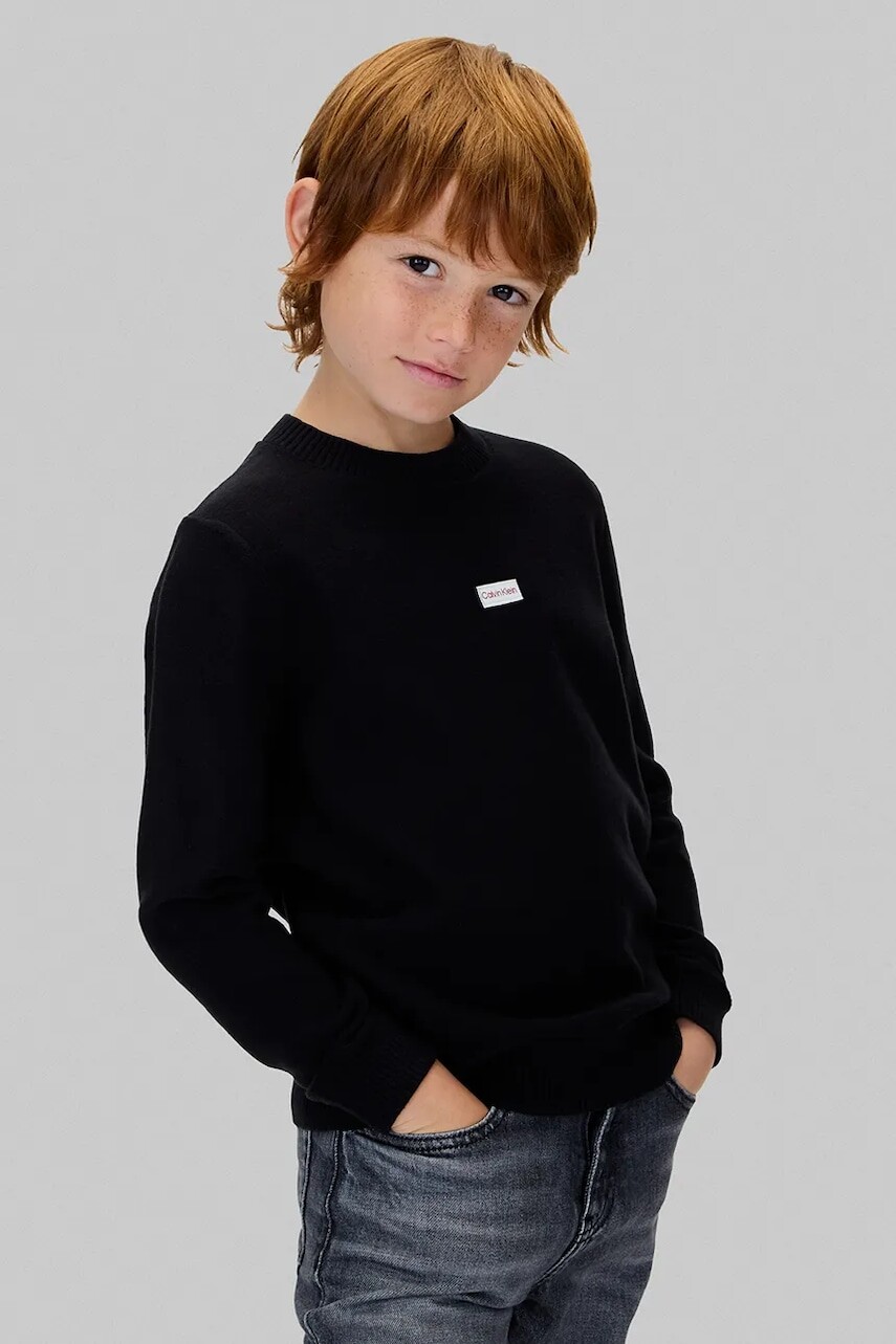 Detská bavlnená mikina Calvin Klein Jeans čierna farba, s nášivkou, IB0IB02596