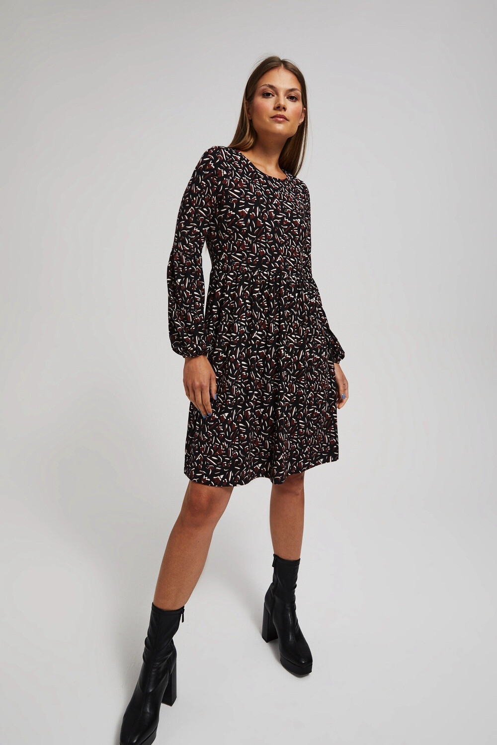 Marisse Black Dress With Puffed Sleeves And A Flared Bottom