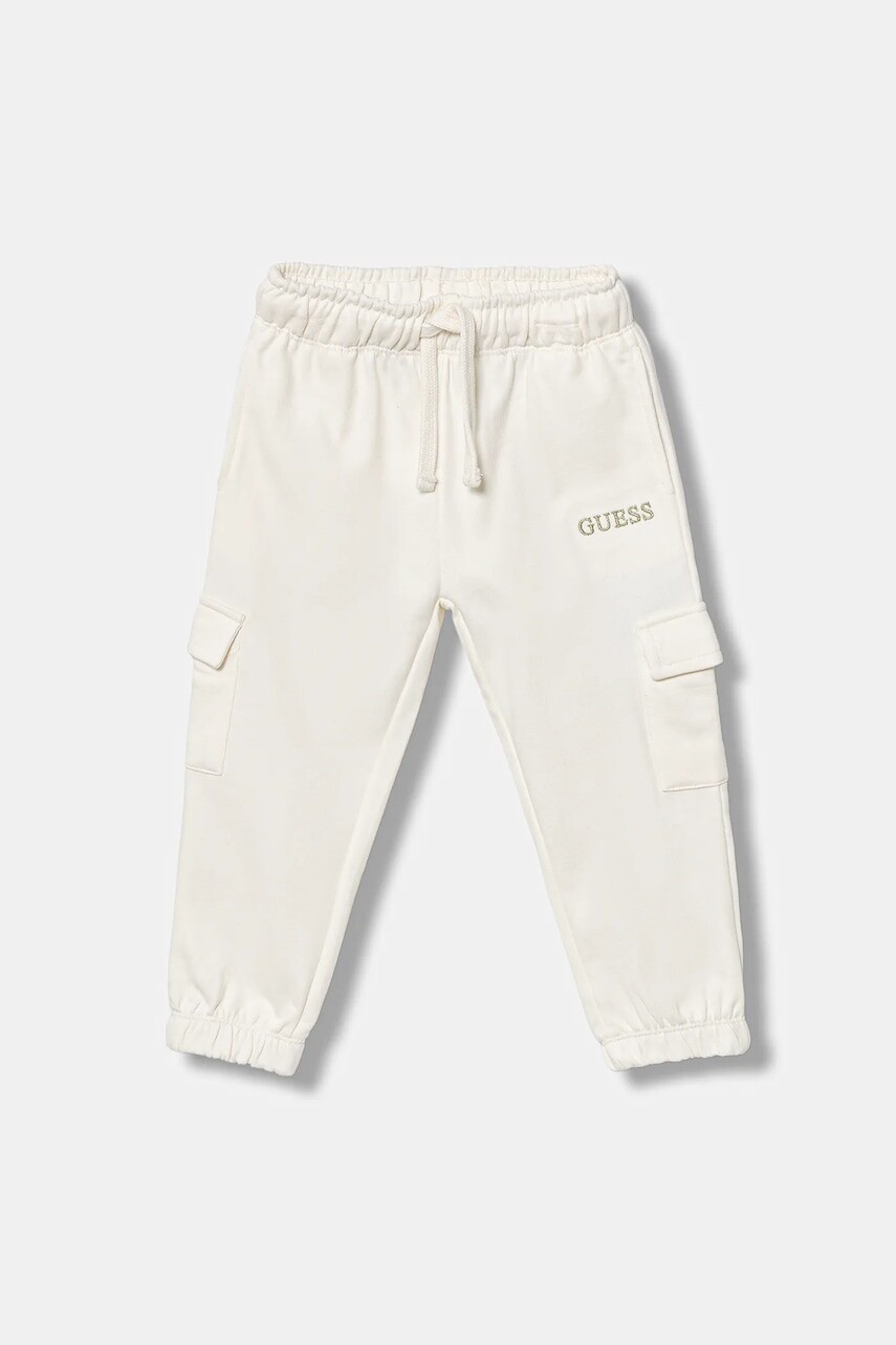 Detské bavlnené tepláky Guess béžová farba, s nášivkou, K5YQ16 KA6R4