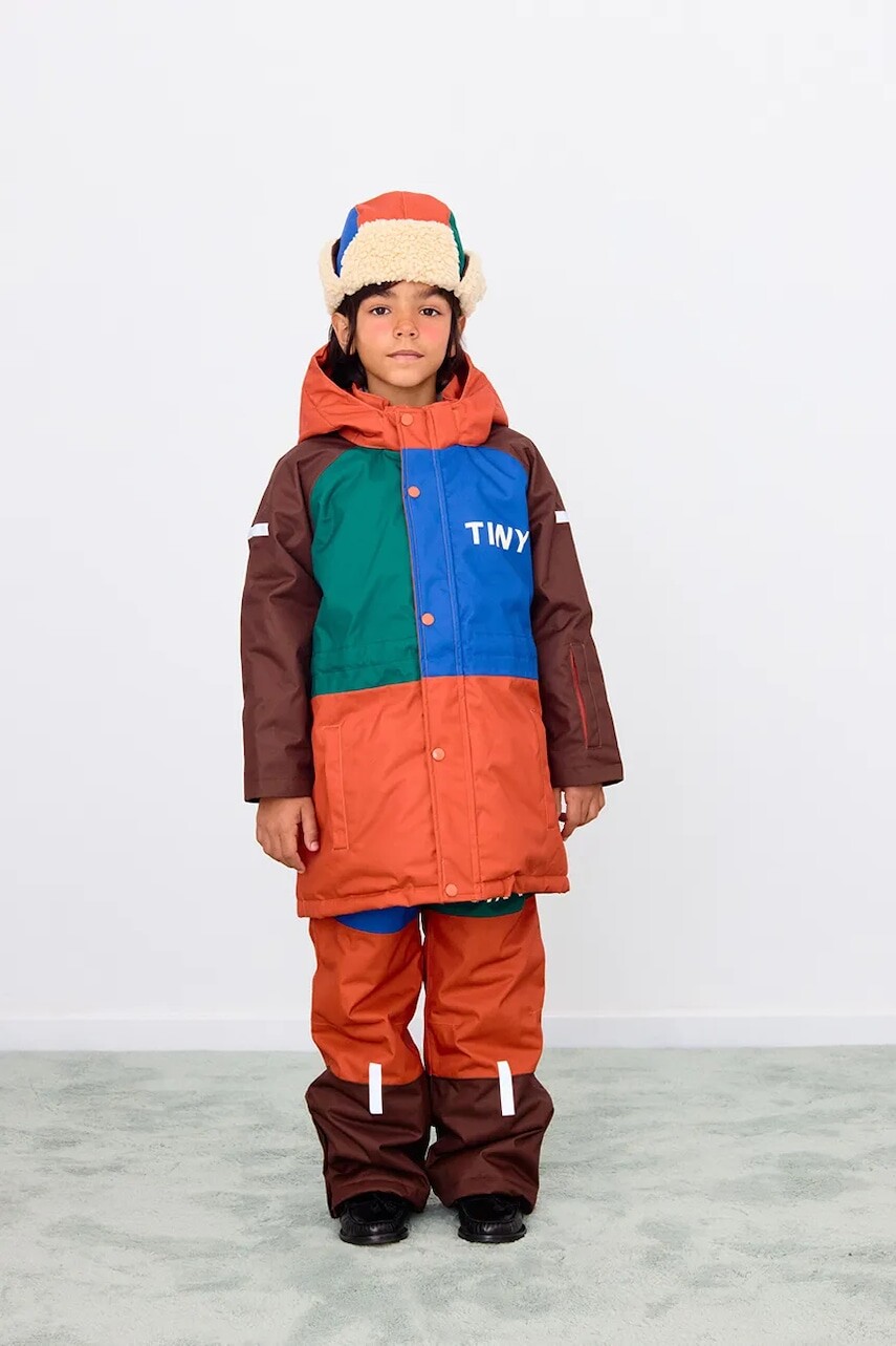 Detská bunda Tinycottons COLOR BLOCK SNOW JACKET oranžová farba, AW25-046