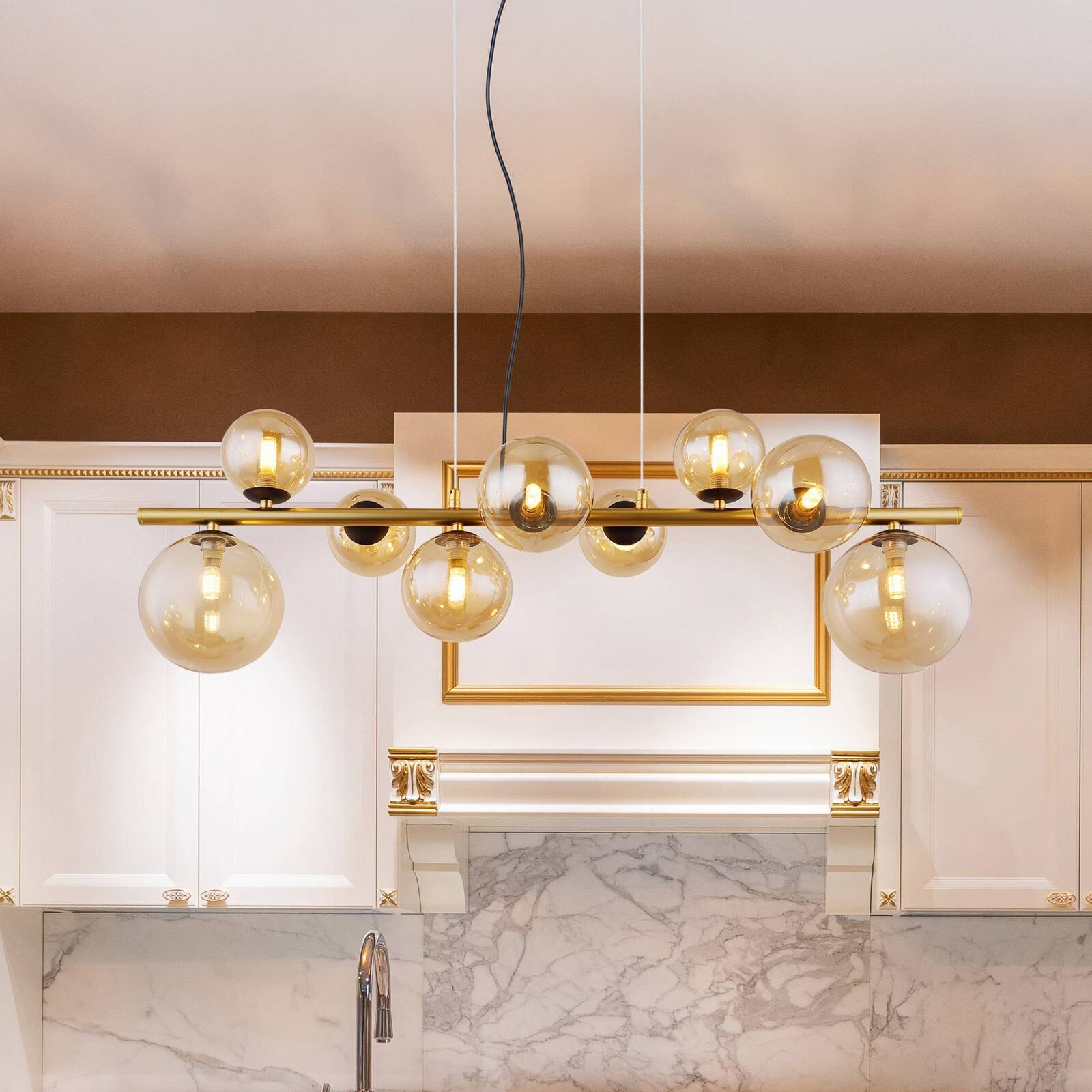 Závesné svietidlo Riha, dĺžka 86 cm, mosadzné, jantárové, 9-pl.