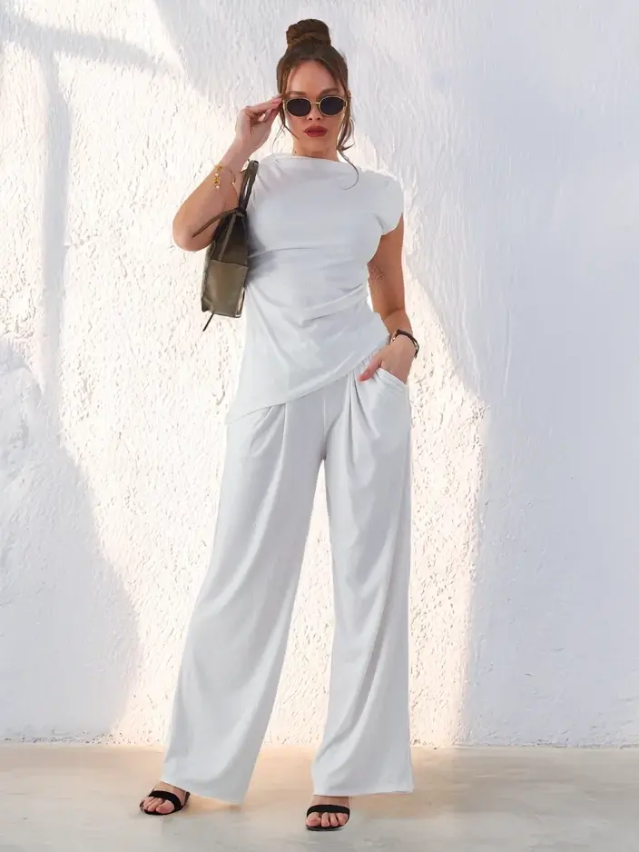 Resti Women's ribbed set, with an asymmetrical sleeveless top and flared pants