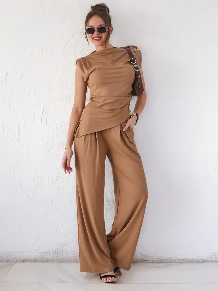 Resti Women's ribbed set with an asymmetrical sleeveless blouse and flared pants