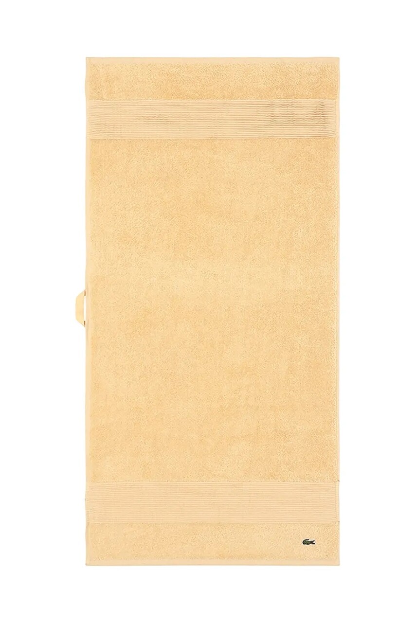 Stredný bavlnený uterák Lacoste L LECROCO Sesame 50 x 100 cm žltá farba