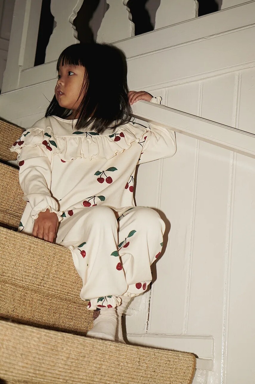 Detské bavlnené tepláky Konges Sløjd MALLI GLITTER PANTS GOTS béžová farba, vzorovaná, KS103894