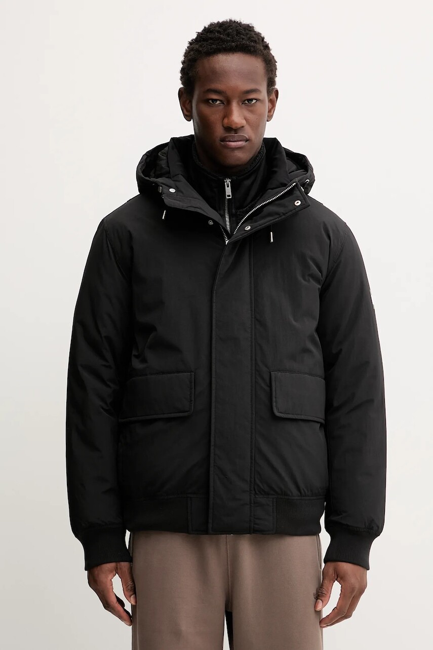 Bunda Tommy Jeans čierna farba, zimná, DM0DM22032