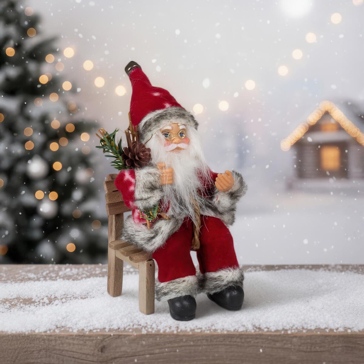 Vianočný ornament Santa na lavičke