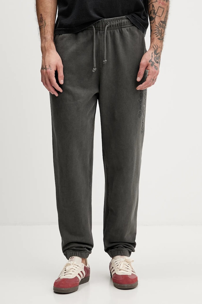 Bavlnené tepláky Tommy Jeans čierna farba, melanžové, DM0DM22360