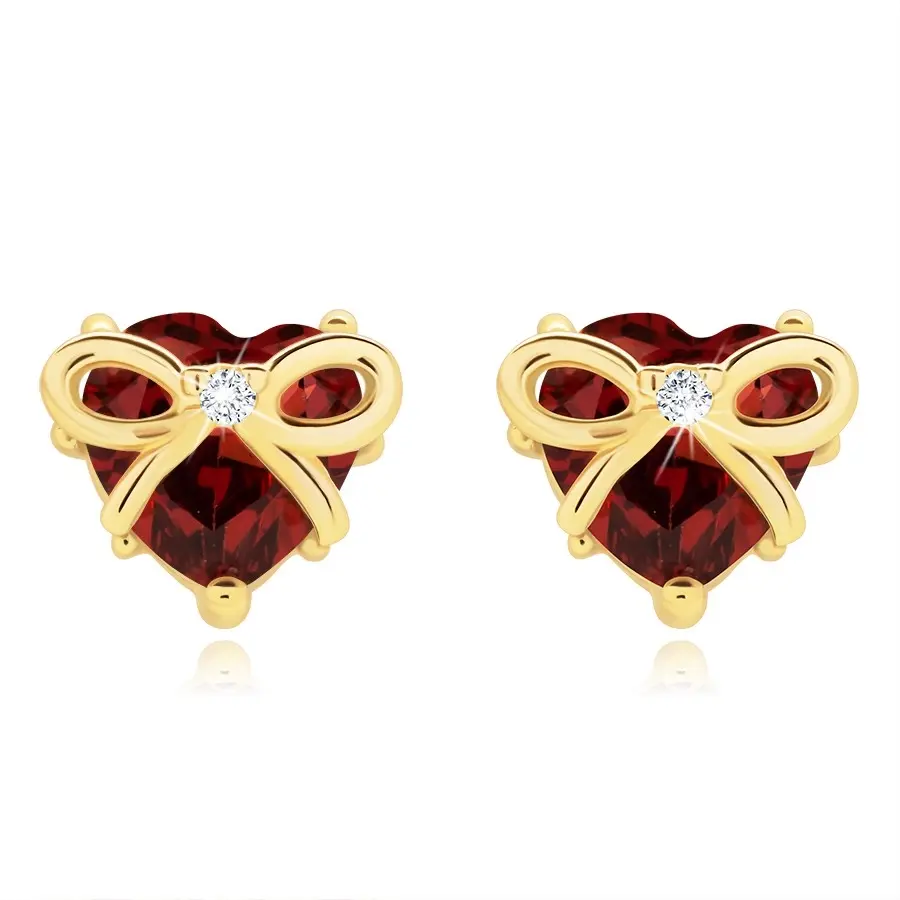 Náušnice zo žltého 14K zlata s granátovým srdcom a mašľou