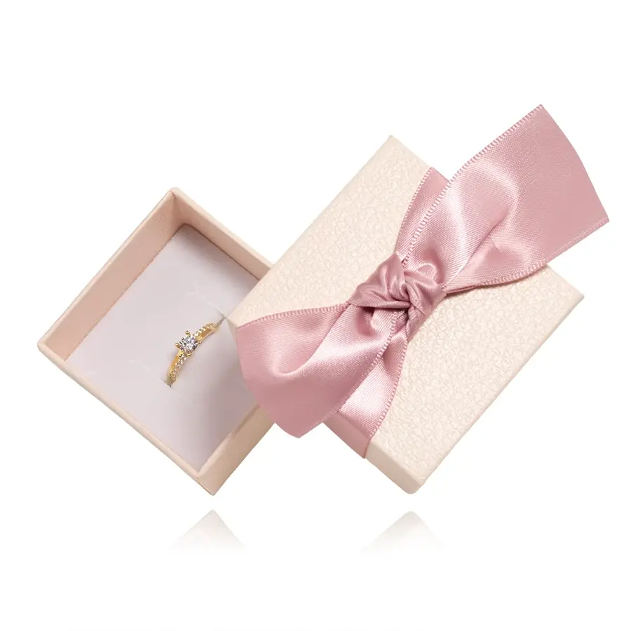 Svetloružová papierová krabička na šperky so saténovou mašľou