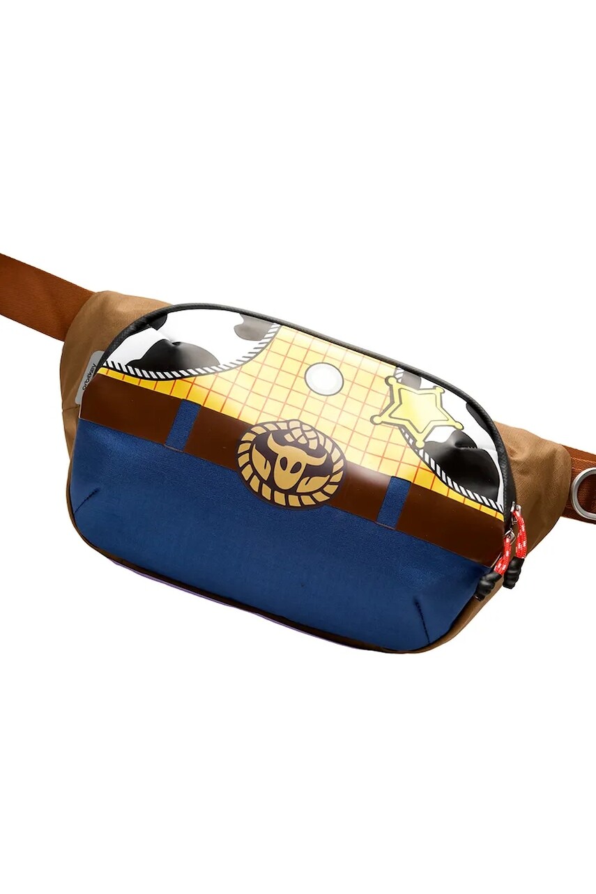 Taška cez rameno Orbitkey Disney™ Sling 4 L x Woody viac farieb