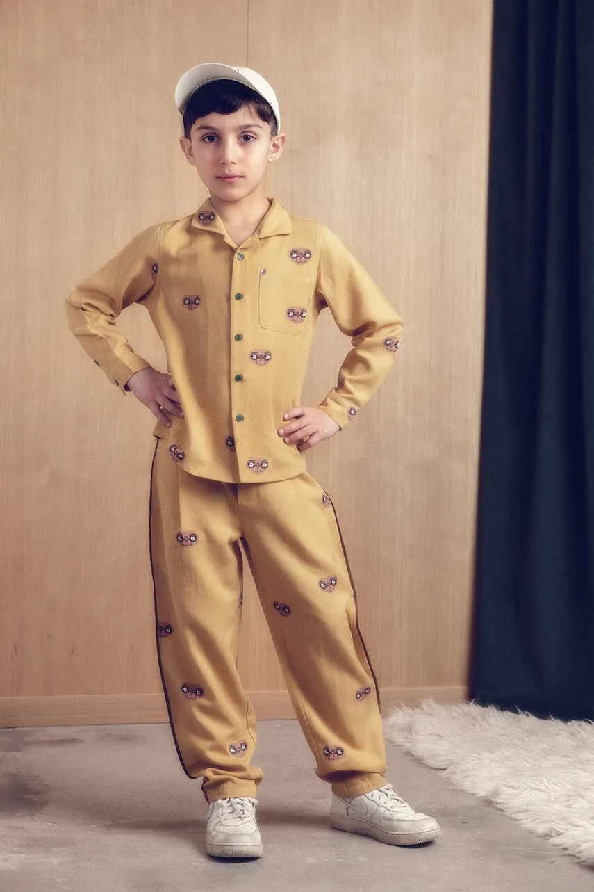 Detské nohavice Mini Rodini E.T. žltá farba, vzorované, 25830115